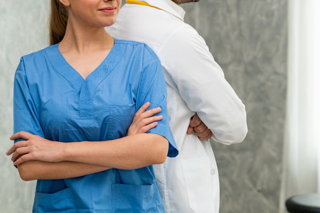 Doctor and nurse working in hospital. Healthcare and medical staff service concept.の写真素材
