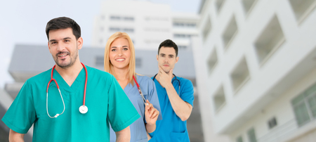 Healthcare people group. Professional doctor working in hospital office or clinic with other doctors, nurse and surgeon. Medical technology research institute and doctor staff service concept.の写真素材