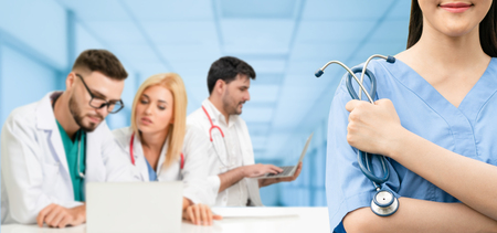 Healthcare people group. Professional doctor working in hospital office or clinic with other doctors, nurse and surgeon. Medical technology research institute and doctor staff service concept.の写真素材