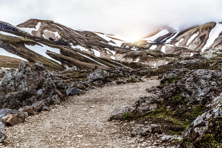 Landscape of Landmannalaugar surreal nature scenery in highland of Iceland, Nordic, Europe. Beautiful colorful snow mountain terrain famous for summer trekking adventure and outdoor walking.の写真素材