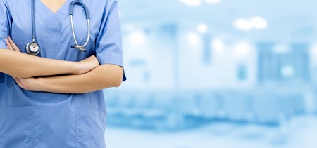 Female doctor or nurse at the hospital office. Medical healthcare business and doctor service.の写真素材
