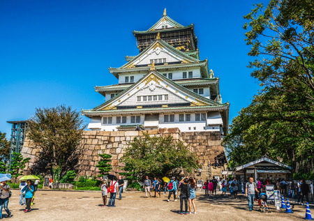 Osaka, Japan - September 28, 2018: Tourist and people visit the Osaka castle in Osaka, Japan. It is the famous landmark and popular tourist destination of Osaka.のeditorial素材