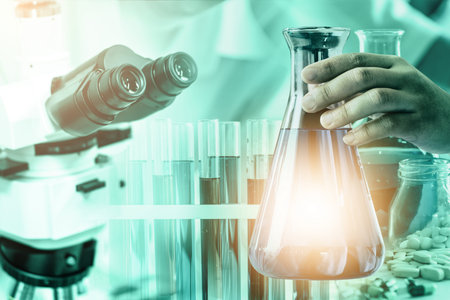 Research and development concept. Double exposure image of scientific and medical lab instrument,...