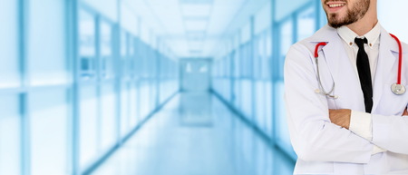 Young male doctor working at the hospital. Medical healthcare and doctor staff service.の写真素材