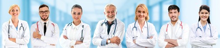 Healthcare people group. Professional doctor working in hospital office or clinic with other doctors, nurse and surgeon. Medical technology research institute and doctor staff service concept.の写真素材