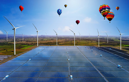 Solar energy panel photovoltaic cell and wind turbine farm power generator in nature landscape for...