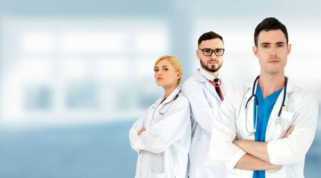 Healthcare people group. Professional doctor working in hospital office or clinic with other doctors, nurse and surgeon. Medical technology research institute and doctor staff service concept.の写真素材