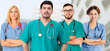 Healthcare people group. Professional doctor working in hospital office or clinic with other doctors, nurse and surgeon. Medical technology research institute and doctor staff service concept.の写真素材