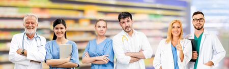 Healthcare people group. Professional doctor working in hospital office or clinic with other doctors, nurse and surgeon. Medical technology research institute and doctor staff service concept.の写真素材