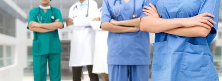 Healthcare people group. Professional doctor working in hospital office or clinic with other doctors, nurse and surgeon. Medical technology research institute and doctor staff service concept.の写真素材