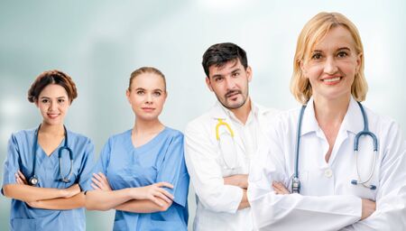 Healthcare people group. Professional doctor working in hospital office or clinic with other doctors, nurse and surgeon. Medical technology research institute and doctor staff service concept.の写真素材