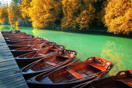 Boats parking at pier with turquoise lake landscape of Plitvice Lakes National Park famous travel destination of Croatia. The lakes are located in central Croatia (Croatia proper).の写真素材