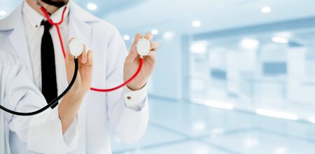 Doctor working with another doctor in the hospital. Healthcare and medical service.の写真素材