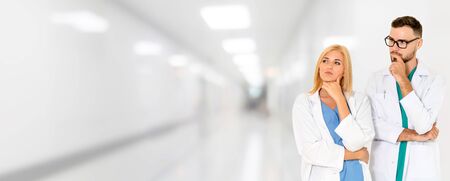 Doctor working with another doctor in the hospital. Healthcare and medical service.の写真素材