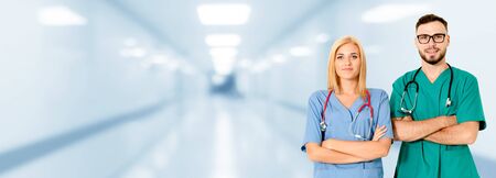 Doctor working with another doctor in the hospital. Healthcare and medical service.の写真素材