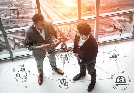 Finance and Money Transaction Technology Concept. Icon Graphic interface showing fintech trade exchange, profit statistics analysis and market analyst service in modern computer application.の写真素材