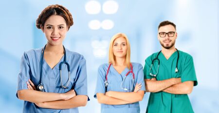 Healthcare people group. Professional doctor working in hospital office or clinic with other doctors, nurse and surgeon. Medical technology research institute and doctor staff service concept.の写真素材