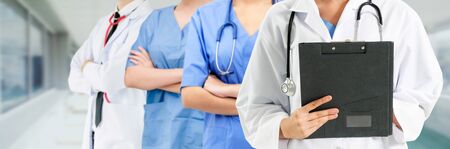 Healthcare people group. Professional doctor working in hospital office or clinic with other doctors, nurse and surgeon. Medical technology research institute and doctor staff service concept.の写真素材