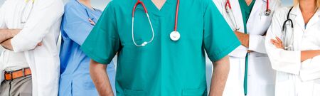 Healthcare people group. Professional doctor working in hospital office or clinic with other doctors, nurse and surgeon. Medical technology research institute and doctor staff service concept.の写真素材