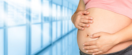 Pregnant woman at hospital health check up. Gynecology heath care concept.