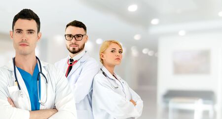 Healthcare people group. Professional doctor working in hospital office or clinic with other doctors, nurse and surgeon. Medical technology research institute and doctor staff service concept.の写真素材