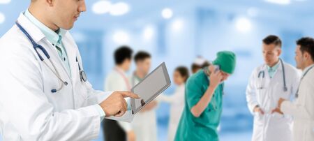 Healthcare people group. Professional doctor working in hospital office or clinic with other doctors, nurse and surgeon. Medical technology research institute and doctor staff service concept.の写真素材