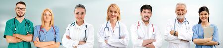 Healthcare people group. Professional doctor working in hospital office or clinic with other doctors, nurse and surgeon. Medical technology research institute and doctor staff service concept.の写真素材