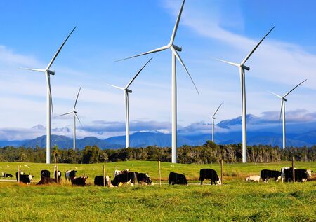 Wind turbine farm power generator in beautiful nature landscape for production of renewable green energy is friendly industry to environment. Concept of sustainable development technology.の写真素材