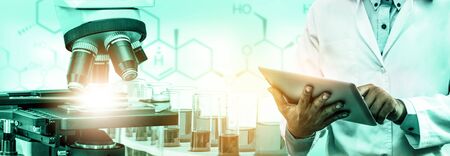 Research and development concept. Double exposure image of scientific and medical lab instrument, microscope, test tube and glass flask for microbiology and chemistry in laboratory for medicine study.の写真素材