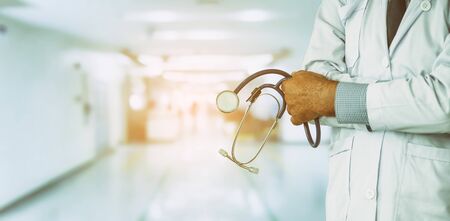 Senior male doctor working at the hospital. Medical healthcare and doctor staff service.の写真素材