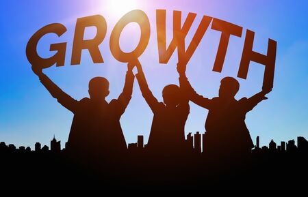 Achievement and Business Goal Success Concept - Creative business people with icon graphic interface showing employee reward giving for business success achievement.の写真素材