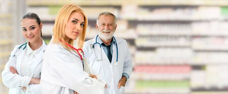 Healthcare people group. Professional doctor working in hospital office or clinic with other doctors, nurse and surgeon. Medical technology research institute and doctor staff service concept.の写真素材
