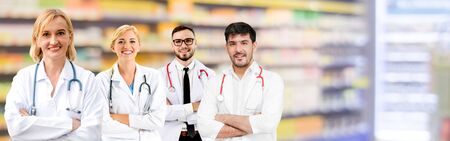 Healthcare people group. Professional doctor working in hospital office or clinic with other doctors, nurse and surgeon. Medical technology research institute and doctor staff service concept.の写真素材