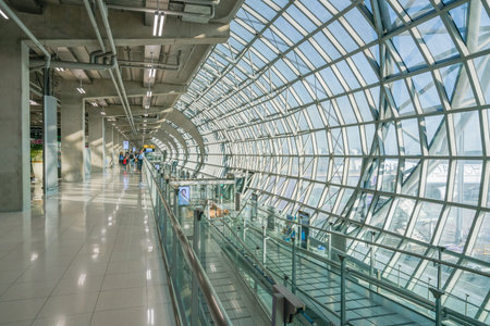 BANGKOK, THAILAND - DEC 11, 2018: Tourists walk in terminal of Suvarnabhumi Airport in Bangkok, Thailand. Suvarnabhumi Airport is one of two international airports serving Bangkok.のeditorial素材
