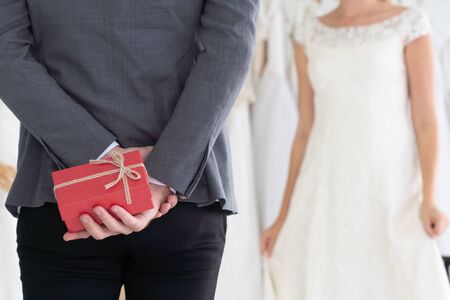 Happy bride and groom in wedding dress prepare for married in wedding ceremony. Romantic  love of man and woman couple.の写真素材