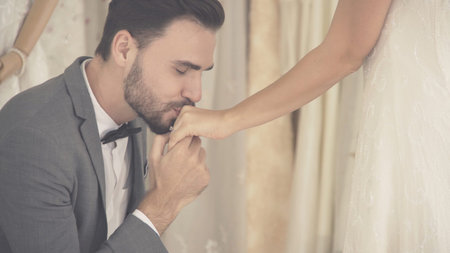Happy bride and groom in wedding dress prepare for married in wedding ceremony. Romantic love of man...