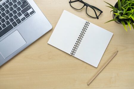 Office desk workspace and table background from top view above flat lay objects. Modern minimal design desktop for creative working. Minimalism concept.の写真素材