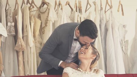 Happy bride and groom in wedding dress prepare for married in wedding ceremony. Romantic love of man and woman couple.の写真素材
