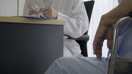 Doctor or physician take care of sick patient at the hospital or medical clinic. The happy patient visit doctor and discuss for illness cure treatment. Medical healthcare and doctor service concept.の写真素材