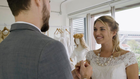 Happy bride and groom in wedding dress prepare for married in wedding ceremony. Romantic love of man...