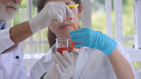 Scientist work with science equipment in laboratory. Scientific experiment and education for research development concept.の写真素材