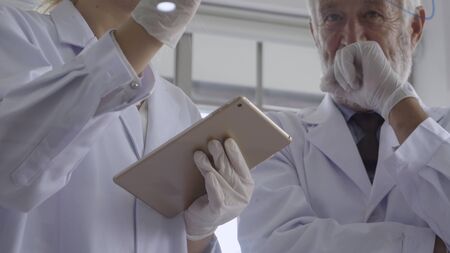 Scientist work with science equipment in laboratory. Scientific experiment and education for research development concept.の写真素材