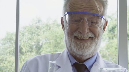 Scientist work with science equipment in laboratory. Scientific experiment and education for research development concept.の写真素材