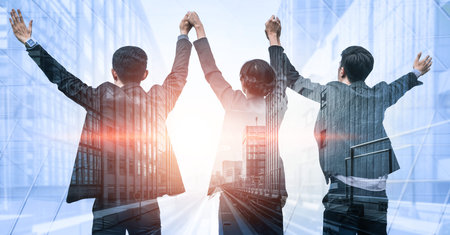 Double exposure image of many business people conference group meeting on city office building in...