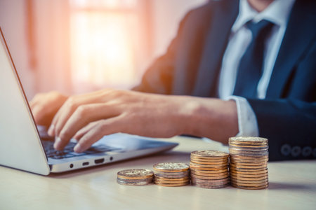 Businessman working with coin money currency. Concept of investment growth and money saving.