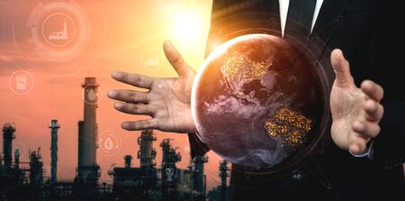 Future factory plant and energy industry concept in creative graphic design. Oil, gas and petrochemical refinery factory with double exposure arts showing next generation of power and energy business.の写真素材