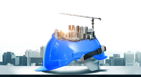 Future building construction engineering project concept with double exposure graphic design. Building engineer, architect people or construction worker working with modern civil equipment technology.の写真素材