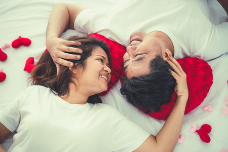 Happy Asian senior couple having good time at home. Old people retirement and healthy citizens...