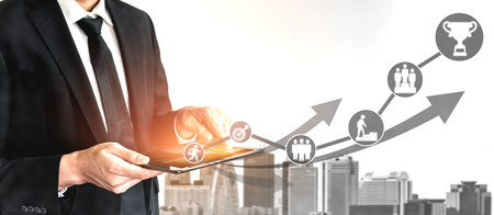 Achievement and Business Goal Success Concept - Creative business people with icon graphic interface...