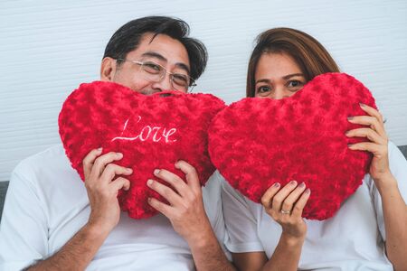 Happy Asian senior couple having good time at home. Old people retirement and healthy citizens elderly concept.の写真素材